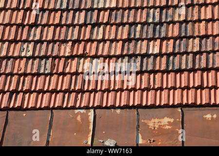 Clay Roof Tiles. Detail of a house roof made with red clay tiles Stock Photo