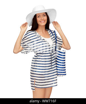 young woman in striped tunic and sun hat Stock Photo