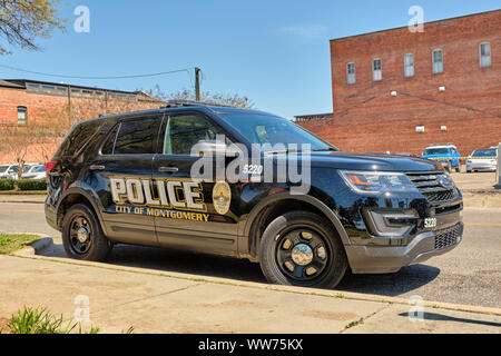 Black police SUV, Ford Explorer police interceptor, parked in downtown Montgomery, Alabama USA. Stock Photo