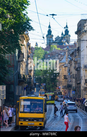 Lviv (Lwiw, Lemberg): Doroshenka street, streetcar, Church of St. Mary Magdalene, today Organ Hall in , Lviv Oblast, Ukraine Stock Photo