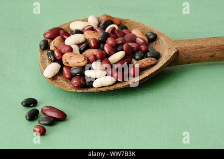 Beans, mixed beans, legumes, wooden spoon Stock Photo