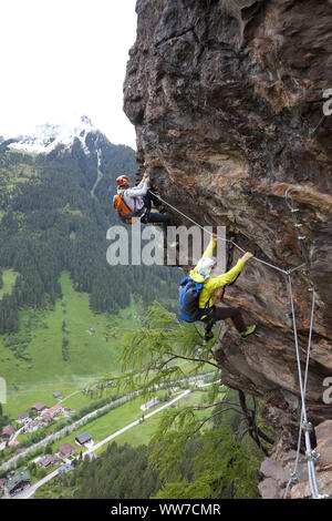 Climber on the via ferrata Nasenwand, Ginzling, Zillertal, Tirol, Austria Stock Photo