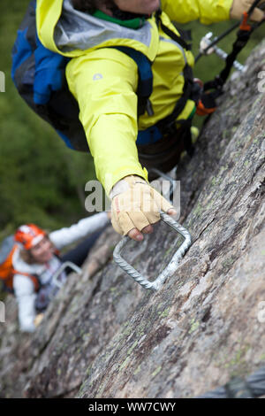 Climber on the via ferrata Nasenwand, Ginzling, Zillertal, Tirol, Austria Stock Photo