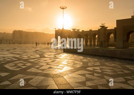 Morocco, Casablanca, mosque Hassan II, forecourt, morning light, people, silhouettes Stock Photo