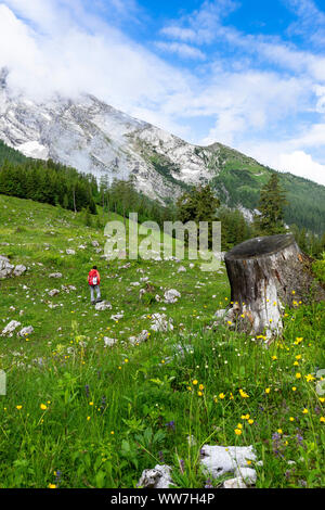 Germany, Bavaria, Berchtesgadener Land, Berchtesgaden, female hiker enjoying the view of the Watzmann Massif Stock Photo