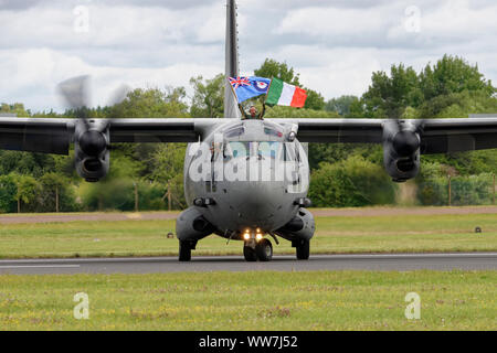 Italian Air Force Leonardo C27J Spartan Military Freight Aircraft salutes the crowd after its display at the RIAT Stock Photo
