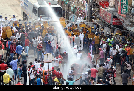 Kolkata, India. 13th Sep, 2019. Police use water canon during Left parties youth and student activist take part in Singur to Nanabbana rally demanding jobs opportunity. (Photo by Saikat Paul/Pacific Press) Credit: Pacific Press Agency/Alamy Live News Stock Photo