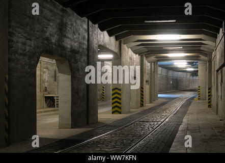 Berlin, Germany. 12th Sep, 2019. Road tunnel with stone pavement and tracks in the direction of hangar no. 4 of the former Tempelhof airport. The airport was one of the first commercial airports in Germany and was used in the years after the withdrawal of the U.S. Air Force as a civil commercial airport within Europe and Germany. The listed airport was closed on 30 October 2008. Credit: Soeren Stache/dpa-Zentralbild/ZB/dpa/Alamy Live News Stock Photo