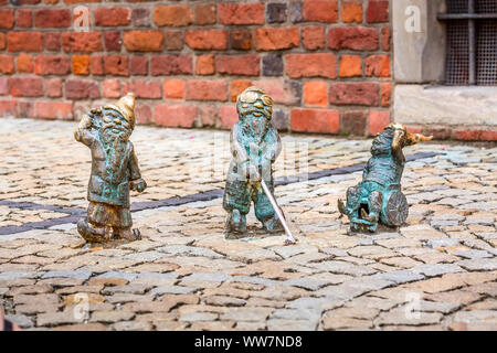Wroclaw, Poland - August 9, 2015: Disabled dwarves on the Market Square, tourist attraction of the city Stock Photo