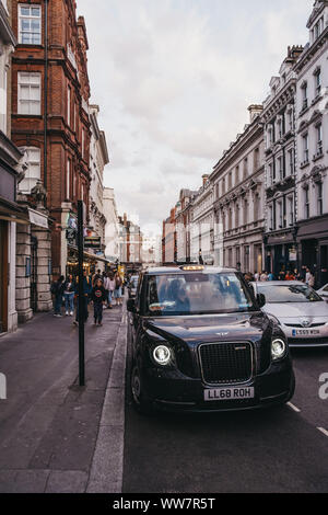 London, United Kingdom - August 31, 2019: Electric LEVC TX London black cab on a street in Covent Garden, London. Black cabs are an important part of Stock Photo