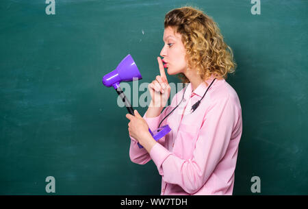 Creativity and inspiration. Light up process of studying. Insight and idea. Bright shiny idea. Educational idea. Knowledge day. Enlightenment concept. Teacher hold table lamp chalkboard background. Stock Photo