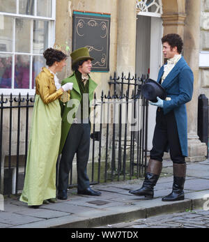 Actors of a period drama filmed by Netflix during breaks Stock Photo