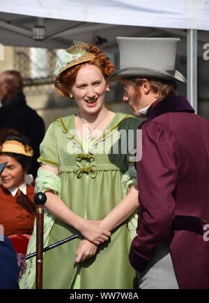 Actors of a period drama filmed by Netflix during breaks Stock Photo