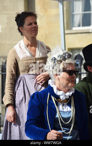 Actors of a period drama filmed by Netflix during breaks Stock Photo