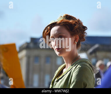 Actors of a period drama filmed by Netflix during breaks Stock Photo