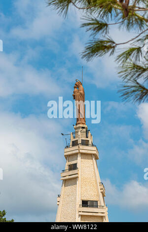 Virgin Mary statue on the top of the mountain. Virgin Mary statue, located on the top of mount Maghdoucheh near Sidon, Lebanon Stock Photo