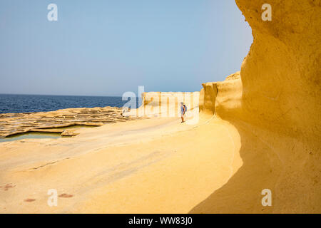 Gozo, neighbouring island of Malta, salt flats, salt pans for sea salt production, in the Xwejni Bay near Marsalforn,