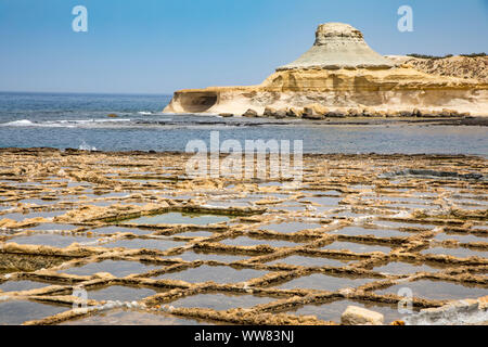 Gozo, neighbouring island of Malta, salt flats, salt pans for sea salt production, in the Xwejni Bay near Marsalforn,