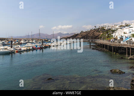 Jetty on the rocky shore, Puerto del Carmen, Lanzarote, Canary Islands, Spain, Europe Stock Photo