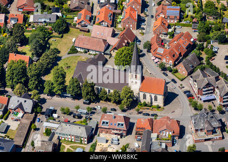 Aerial view, Catholic Church St. Ambrosius Ostbevern, Bahnhofstrasse, corner HauptstraÃŸe, MÃ¼nsterland, North Rhine-Westphalia, Germany, Europe Stock Photo