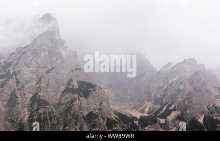 Autumn hike around the Pragser Wildsee in the Dolomites, Italy, Seekofel, cloudy Stock Photo