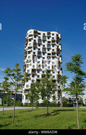 Germany, Bavaria, Munich, modern housing estate, skyscraper, park Stock Photo