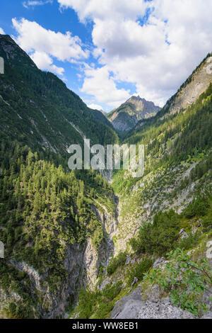 Lechtaler Alpen, Lechtal Alps, hiker trekker at valley of stream Zammer Loch, TirolWest Region, Tyrol, Austria
