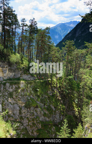 Lechtaler Alpen, Lechtal Alps, hiker trekker at valley of stream Zammer Loch, TirolWest Region, Tyrol, Austria