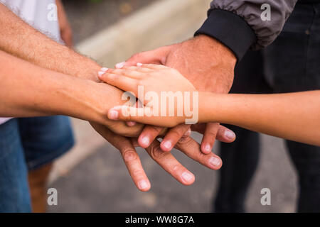 team and family concept image with hands touching together in outdoor, love and relationship and friendship picture, caucasian people Stock Photo