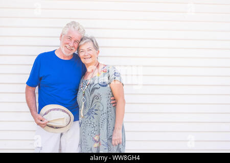 Happy senior couple laughing hugged on a summer day, concept of vacation, relaxation, rest Stock Photo
