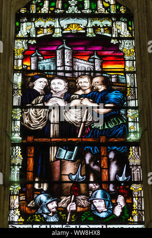 England, Kent, Canterbury, Canterbury Cathedral, The Chapter House, Stained Glass Window depicting An Execution in The Tower of London Stock Photo