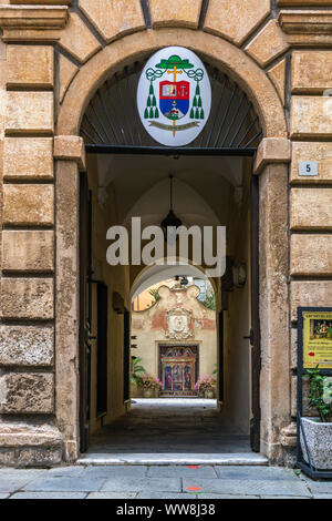 Narrow streets in the historic old part of the Italian city of Albenga in Liguria, Italy Stock Photo