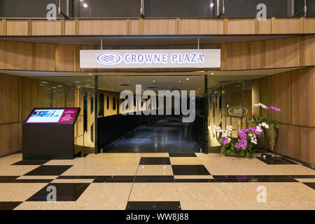 SINGAPORE - CIRCA APRIL, 2019: entrance to Crowne Plaza at Singapore Changi Airport. Stock Photo