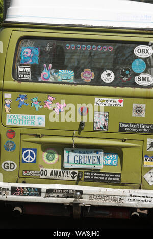 Van covered in bumper stickers Stock Photo