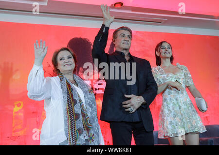 (L-R) Alejandra Barraza; Sylvester Stallone and Yvette Monreal poses for photos during Rambo: Last Blood film press conference at Four Season Hotel on September 12, 2019 in Mexico City, Mexico (Photo by Francisco Morales/DAMMPHOTO) Stock Photo