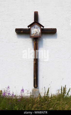 Cross at the Meien Chapel, Husen, Meiental Valley, Canton of Uri, Switzerland Stock Photo