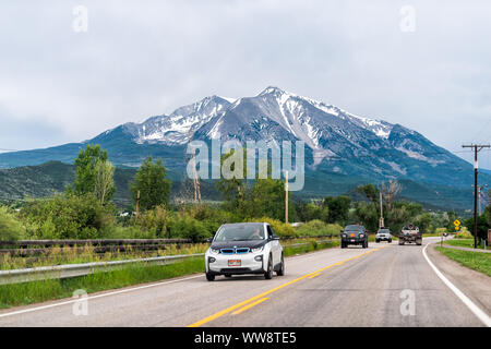 Carbondale, USA - July 1, 2019: Road highway street near Aspen, Colorado town with cars in traffic and view of Mt Sopris Stock Photo