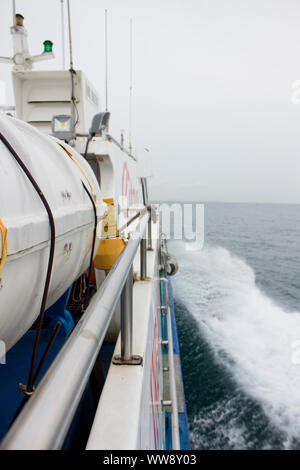 BATAM, INDONESIA - 12 DECEMBER 2018: POV for the ferry sailing from the side and water moving. Stock Photo