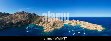 Stunning panoramic view of Cala Coticcio also known as Tahiti with its rocky coasts and small beaches bathed by a turquoise cllear water. Stock Photo