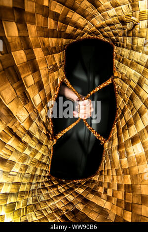 Perspective as viewed from the inner of a retro handmade rattan bag basket Stock Photo