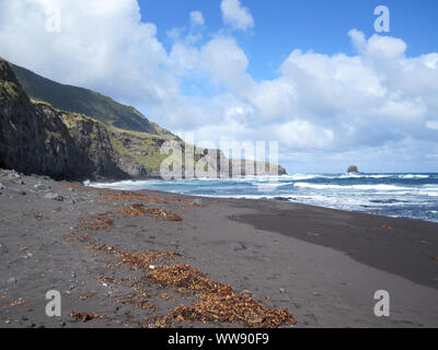 A black volcanic beach on the remote South Atlantic island of Tristan de Cuna Stock Photo