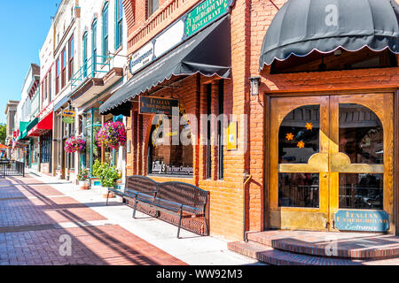 Glenwood Springs, USA - July 10, 2019: Historic street sidewalk in Colorado on Grand Avenue and Italian restaurant Stock Photo