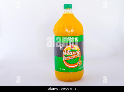 Alberton, South Africa - a bottle of Mazoe orange flavored cordial produced in Zimbabwe isolated on a white background image with copy space Stock Photo