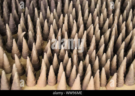 Handmade incense cones sold as traditional souvenirs by the Hmong people living in Sa pa, Vietnam Stock Photo