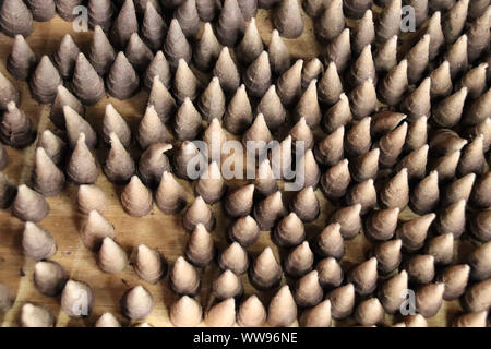 Handmade incense cones sold as traditional souvenirs by the Hmong people living in Sa pa, Vietnam Stock Photo