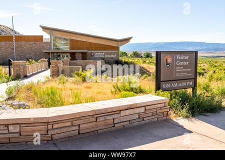 Jensen, USA - July 23, 2019: Quarry visitor center exterior in Dinosaur National Monument Park outside with sign to entrance in Utah Stock Photo