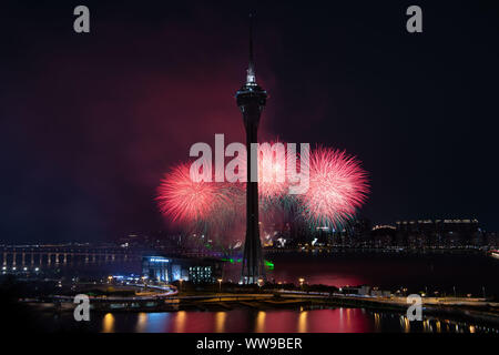 Beijing, China. 13th Sep, 2019. Fireworks celebrating the Mid-Autumn Festival lights up the sky in Macao, south China, on Sept. 13, 2019. Credit: Cheong Kam Ka/Xinhua/Alamy Live News Stock Photo