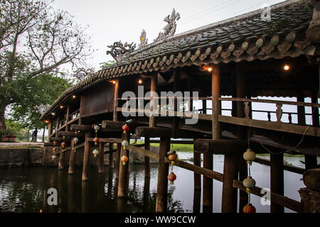 Cinematic scenery of the 244-year-old Thanh Toan Bridge in Thanh Thuy Chanh Village in Hue that is considered a national heritage of Vietnam Stock Photo