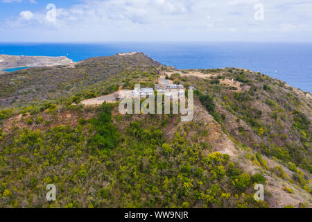 Aerial view of the Shirley Heights belvedere on hilltop with English Harbour in the far background, Antigua, Caribbean, West Indies Stock Photo