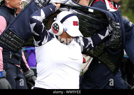 Team USA's Lizette Salas puts on her jacket on the 13th tee during the Foursomes match on day two of the 2019 Solheim Cup at Gleneagles Golf Club, Auchterarder. Stock Photo